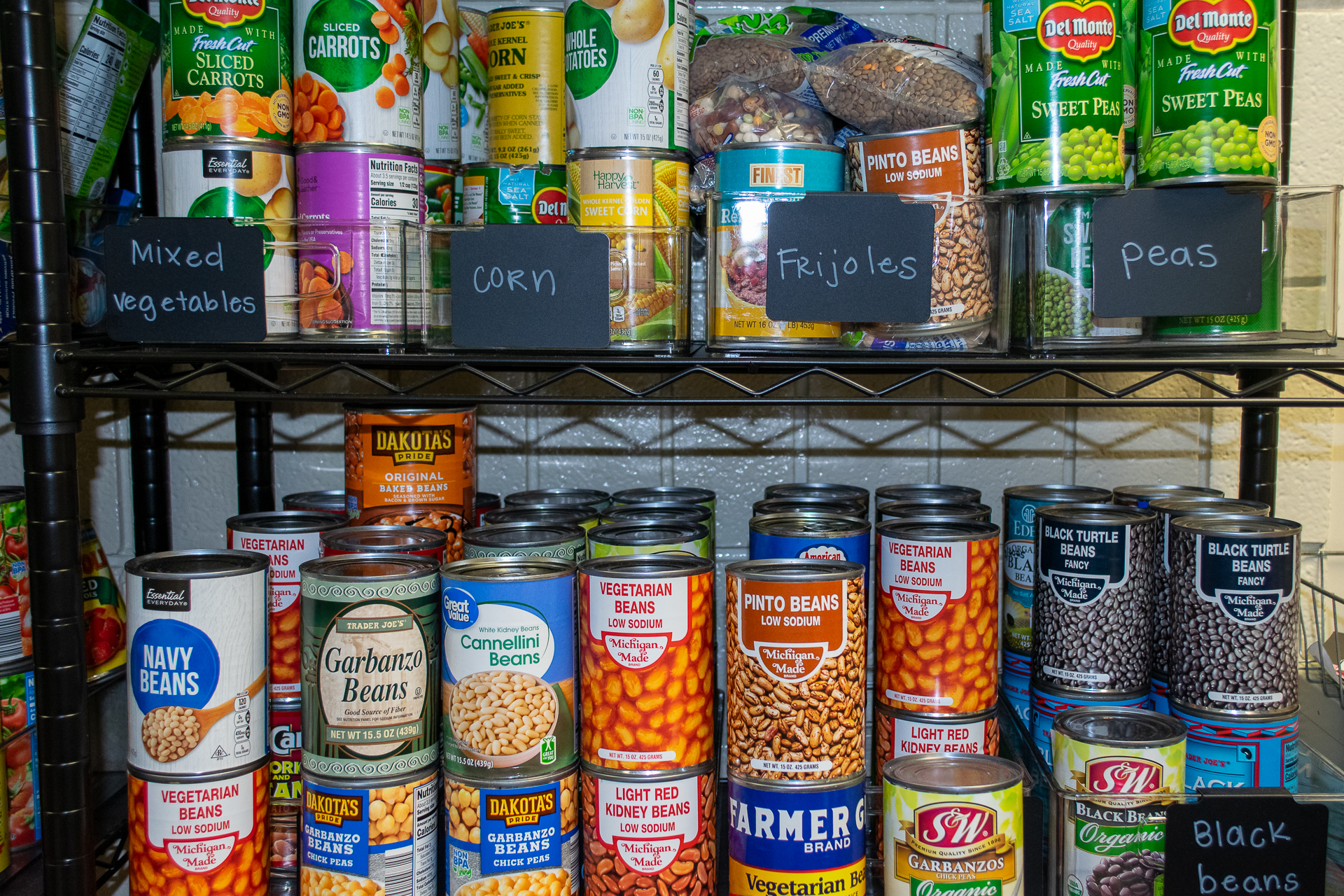 Cans of food on metal shelves